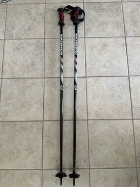 Rossignol Black and Red Ski Poles with Ergonomic Grips